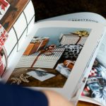 Flatlay of a magazine showing stylish wrapped gifts and holiday decor inspiration, perfect for identifying home decor preferences