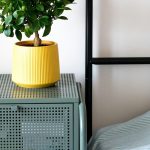 A cozy bedroom corner with smart styling and slimline storage